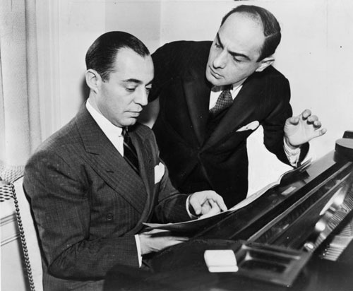 Richard Rodgers (seated) with Lorenz Hart 